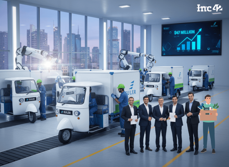 A modern EV production facility with workers assembling vehicles, robotic arms, and a team of executives.